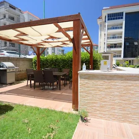 Second Building By Beach/второй комплекс у пляжа Apartman